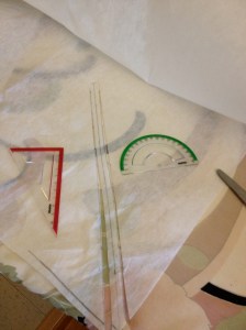 This is me making my own stay tape with fusible interfacing cut on the bias. The geometry set I had left over from when I taught Grade 6 math came in handy.