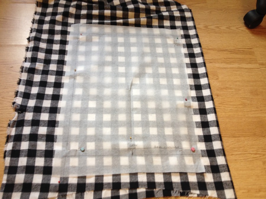 I made my pattern on parchment paper (yes, the stuff in your kitchen!), but any paper will do. The parchment paper worked well since it's transluscent and bigger than normal paper.